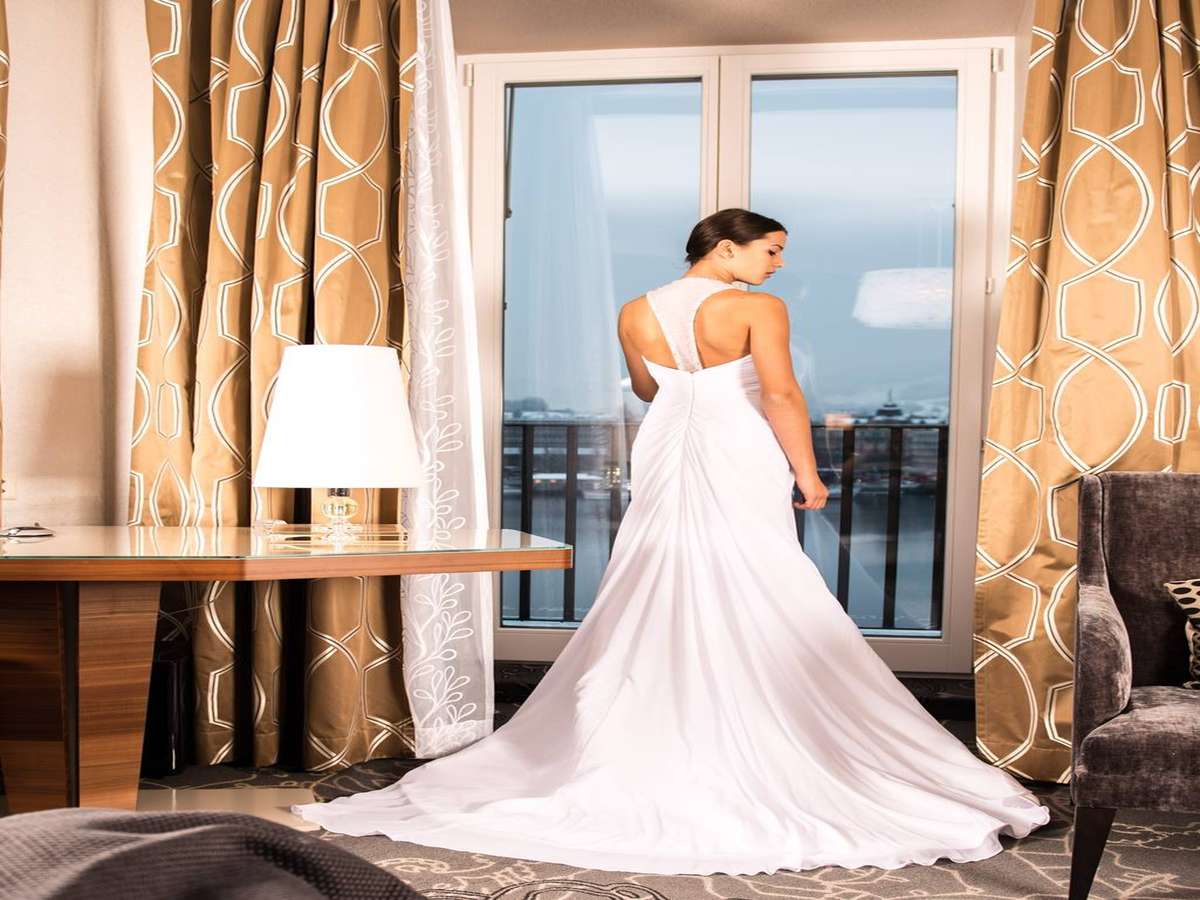 Bride Sues, Says American Airlines Intentionally Ruined Her Wedding Dress
