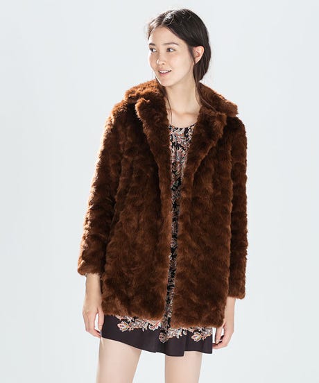 Subscribe to our mailing list Description: From Shannon Fabrics, this super soft high quality faux fur fabric has a 45mm long lustrous pile. It's perfect for stuffed animals, faux fur jackets and vests, pillows and throws. Color is a burnt orange with black accents.