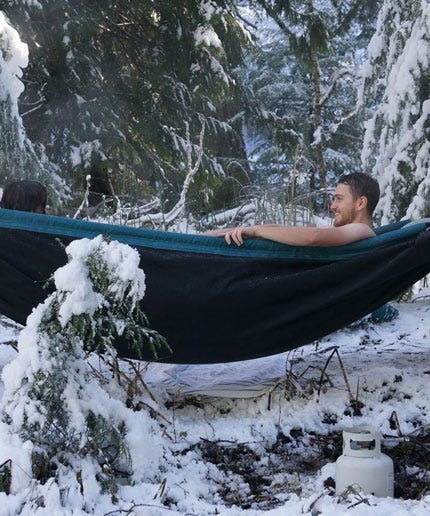 whoa, this portable hammock doubles as a hot tub