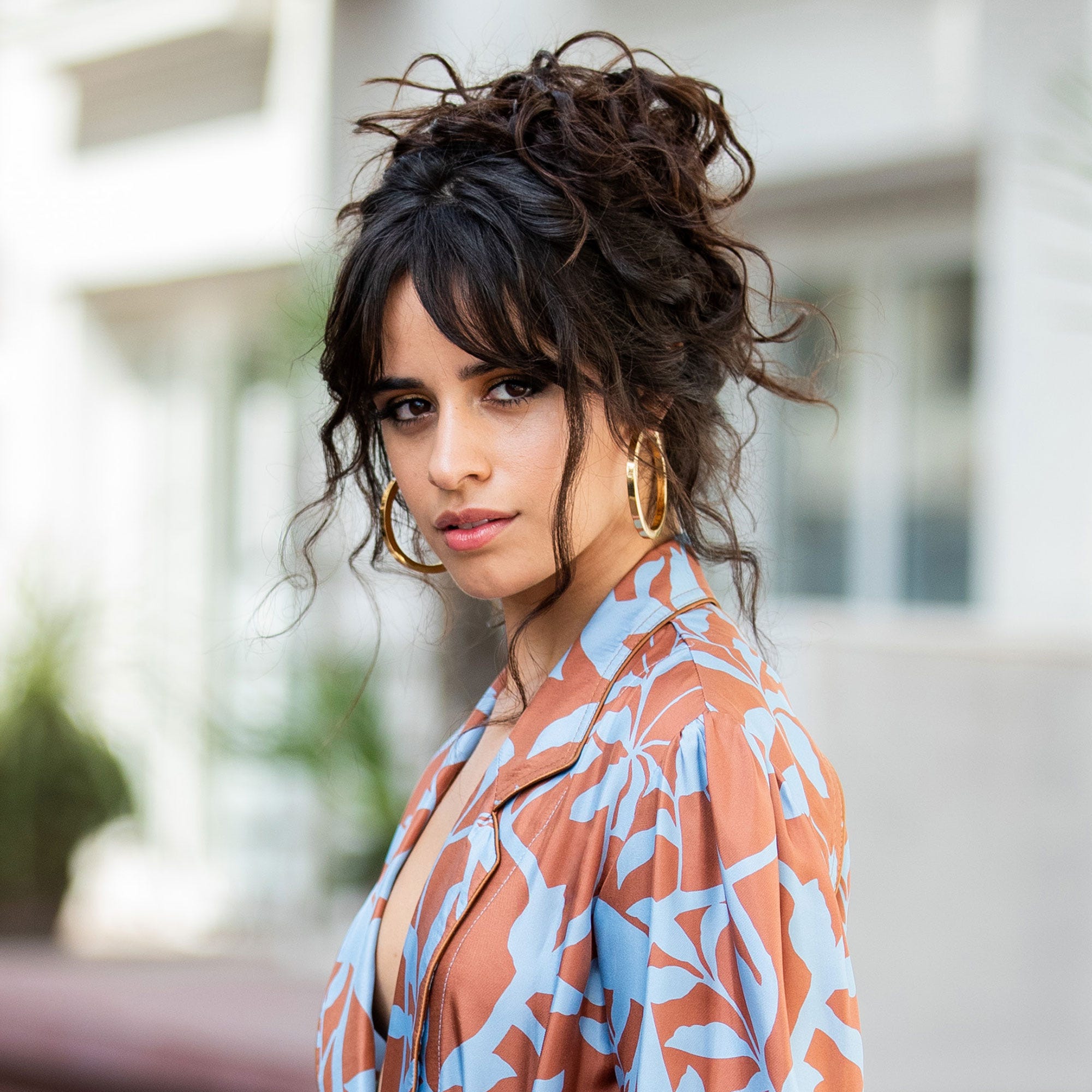 How To Style Bangs In The Summer Based On Hair Type