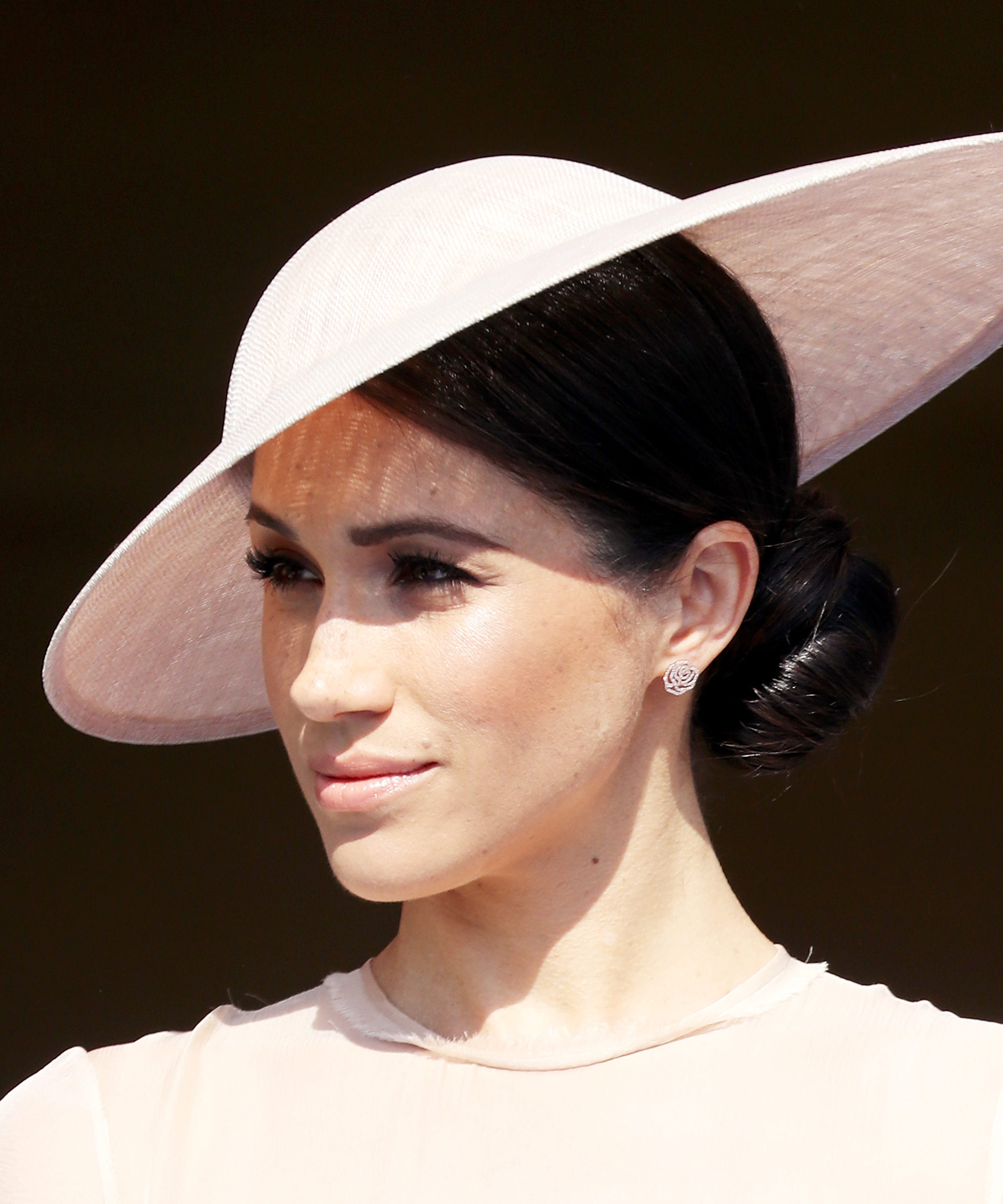 Meghan Markle Swaps Her Messy Bun For A Sleek Chignon