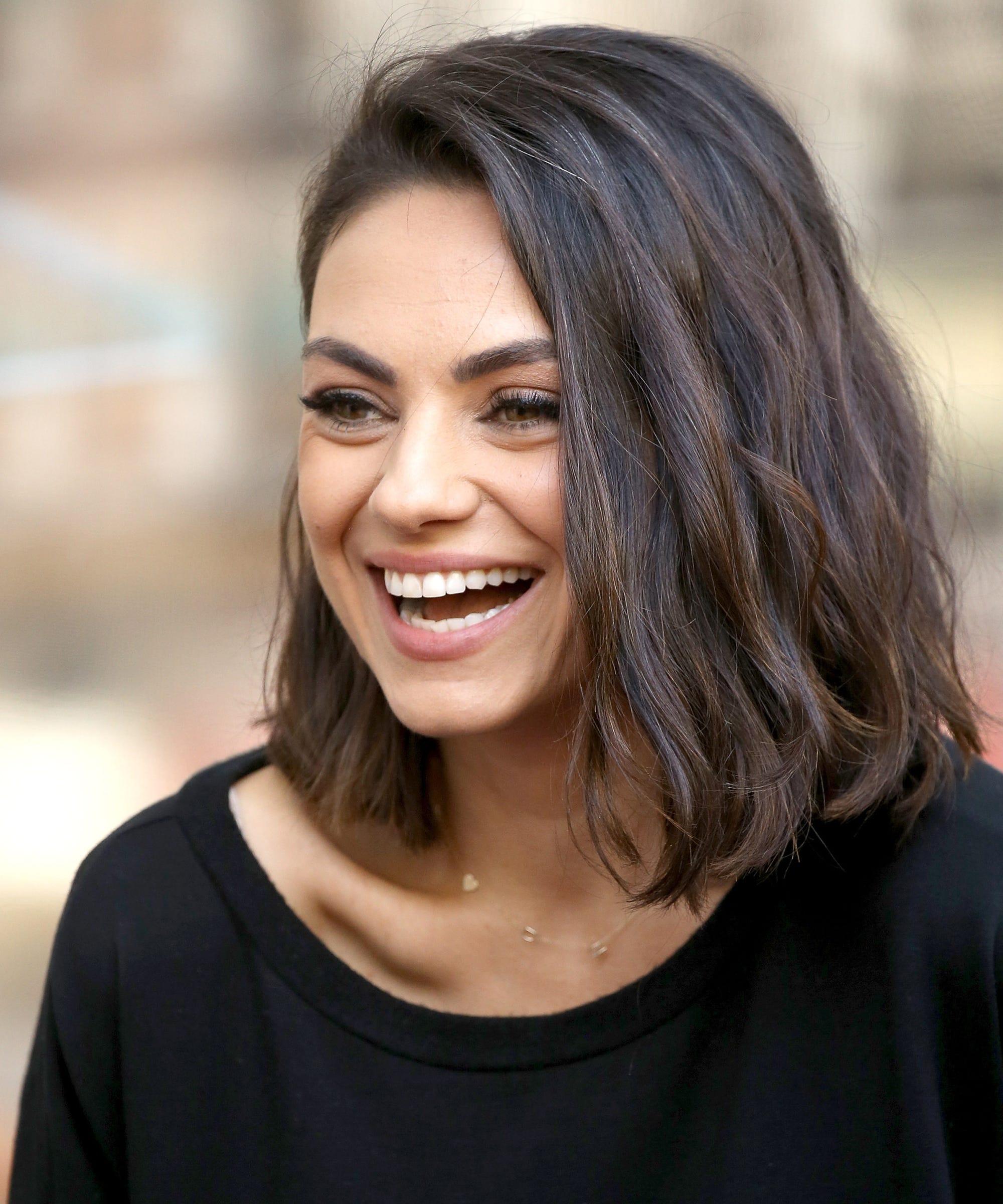 Image of Mila Kunis with blunt cut shoulder-length hair